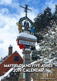 Photo of the Mayfield village sign in snow on cover of 2019 Mayfield and Five Ashes calendar